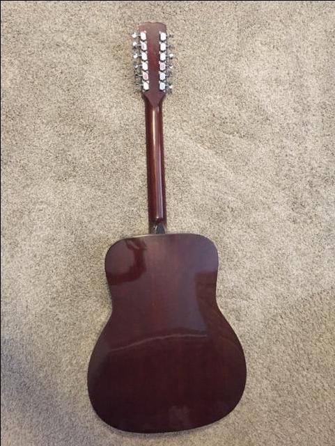 Conn 12 deals string guitar