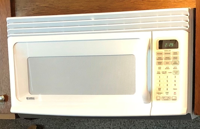 Sold at Auction: KENMORE 1000W UNDER CABINET MICROWAVE
