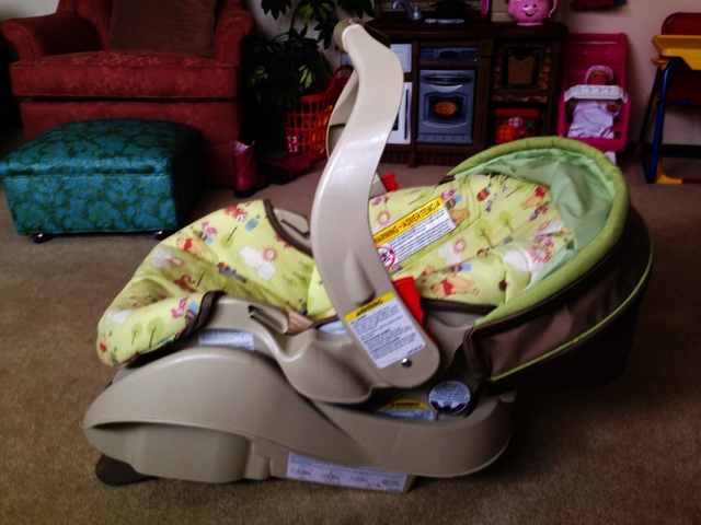winnie the pooh car seat and stroller combo