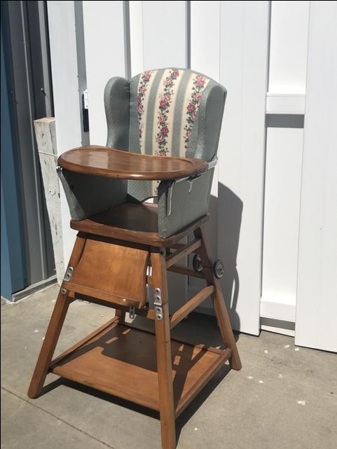 antique wooden high chair with wheels