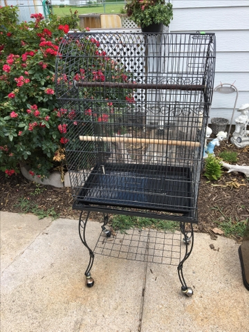 large bird cage with stand